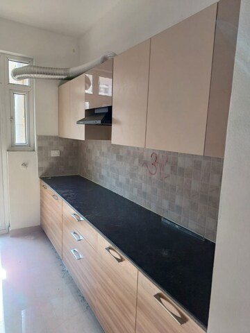 Kitchen in 3 BHK Apartment at ATS Nobility, Sector 4, Greater Noida – for Rent