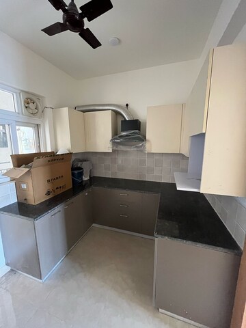 Kitchen in 3.5 BHK Apartment at ATS Rhapsody, Sector 1 Greater Noida – for Rent
