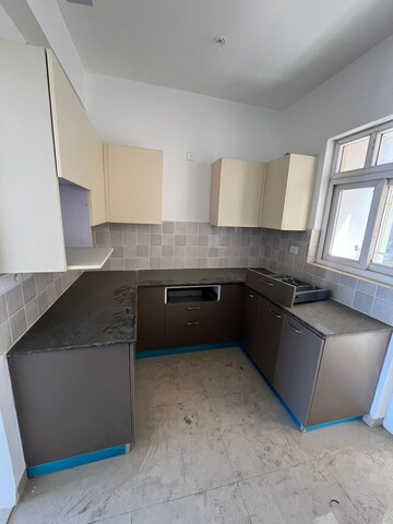 Kitchen in 3.5 BHK Apartment at ATS Rhapsody, Sector 1 Greater Noida – for Sale
