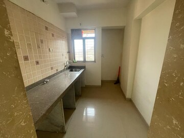 Kitchen in 1 BHK Apartment at Sanghvi Valley, Kalwa – for Sale