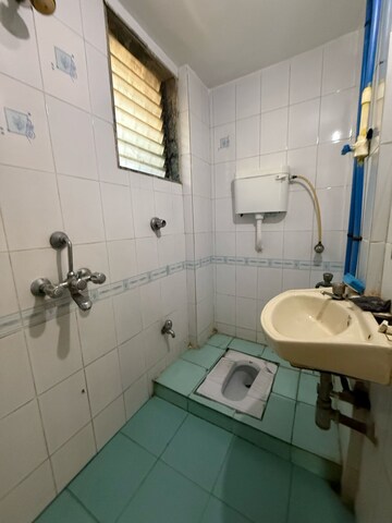 Bathroom in 2 BHK Apartment at Seawoods – for Sale