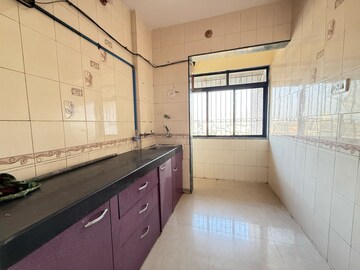 Kitchen in 2 BHK Apartment at Seawoods – for Sale
