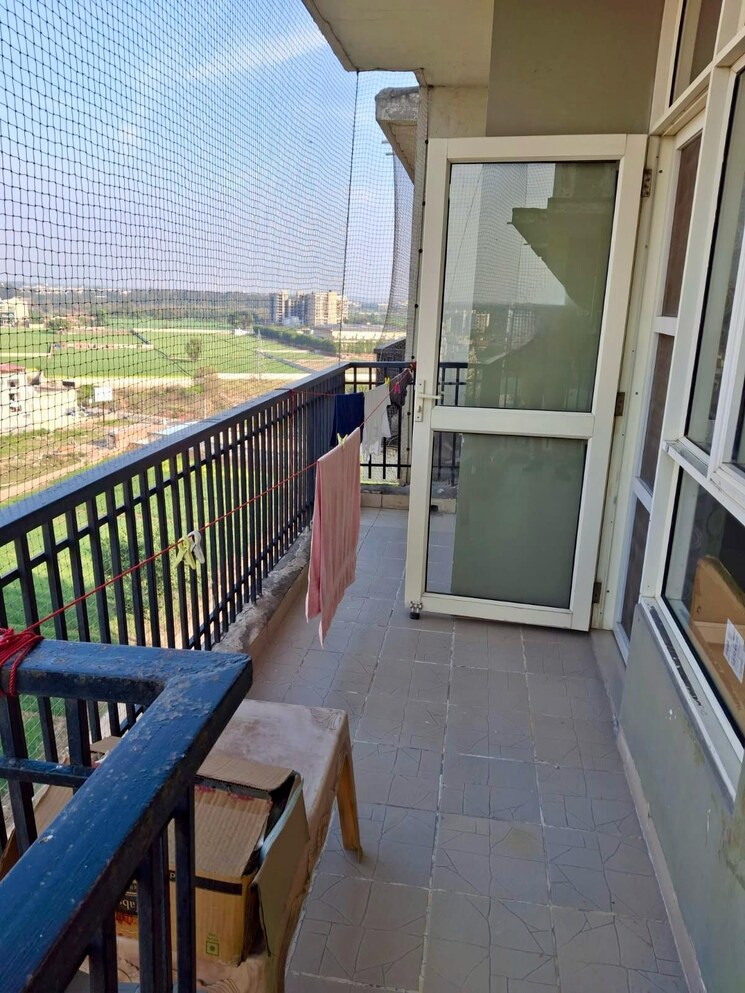 Balcony, sushma-green-vista 2 Bedroom 900 Sq.Ft. Apartment In Ghazipur Zirakpur 8368688
