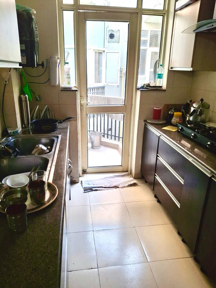 Kitchen, sushma-green-vista 2 Bedroom 900 Sq.Ft. Apartment In Ghazipur Zirakpur 8368688