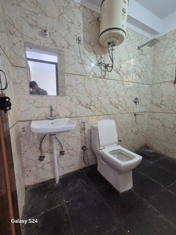 Bathroom in 2 BHK Apartment at Palm Residency Chhatarpur, Chattarpur – for Rent