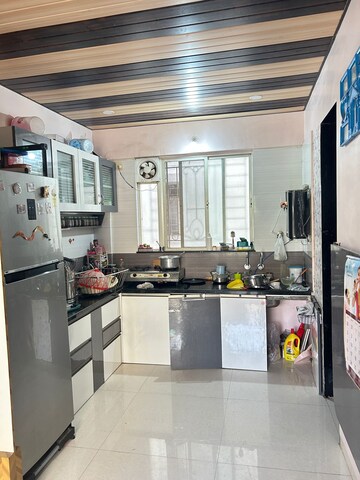 Kitchen in 3 BHK Apartment at Sukhwani Palm Breeze, Pimple Saudagar – for Rent