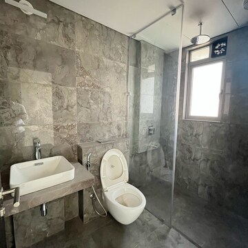 Bathroom in 3 BHK Apartment at Oberoi Sky City, Khande Rao Dongari – for Rent