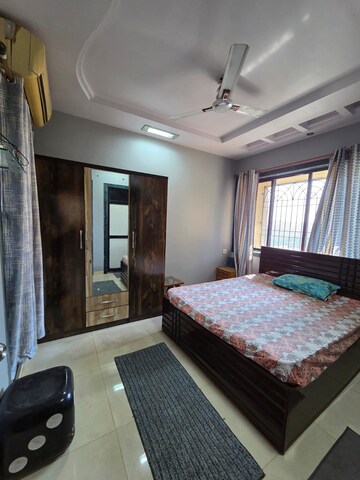 Bedroom in 2 BHK Apartment at Neelkanth Pride CHS, Seawoods – for Rent