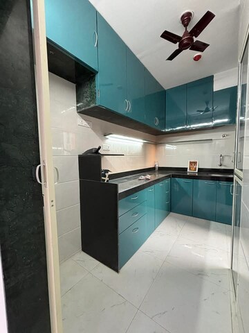 Kitchen in 2 BHK Apartment at Runwal Gardens, Dombivli East – for Rent