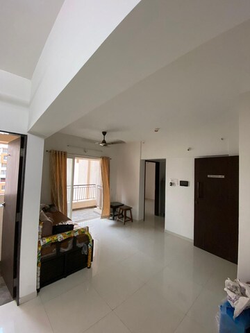 Living Room in 1 BHK Apartment at Puranik Abitante, Bavdhan – for Rent