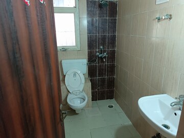 Bathroom in 4 BHK Apartment at KDP Grand Savanna, Raj Nagar Extension – for Rent