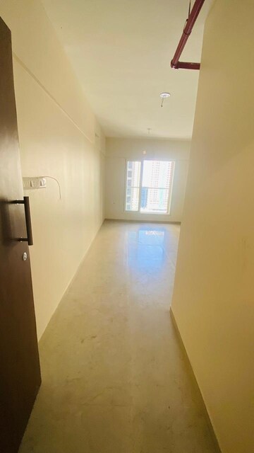 Living Room in 1.5 BHK Apartment at Dosti West County, Balkum Pada – for Rent