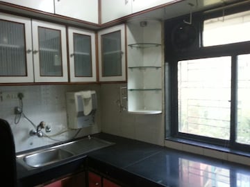 Kitchen in 2 BHK Apartment at Ani Anu Sri Balaji Enclave, Malad West – for Sale