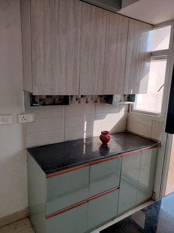 Kitchen in 2 BHK Apartment at Signature Global The Millennia, Sector 37d – for Rent