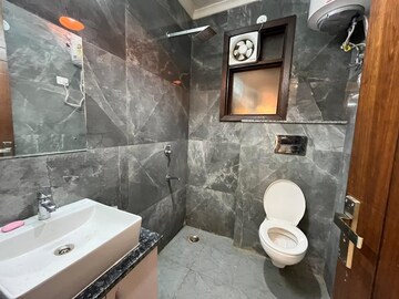 Bathroom in 2 BHK Builder Floor at Freedom Fighters Enclave – for Rent