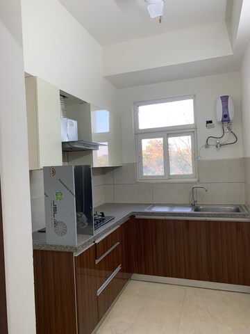 Kitchen in 3 BHK Apartment at Puri Aanandvilas, Sector 81 – for Rent