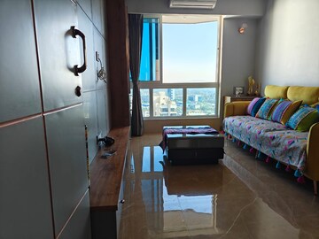 Living Room in 1 BHK Apartment at Upper East 97, Malad East – for Rent
