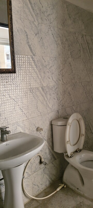 Bathroom in 2 BHK Apartment at Prateek Grand City, Siddharth Vihar – for Rent
