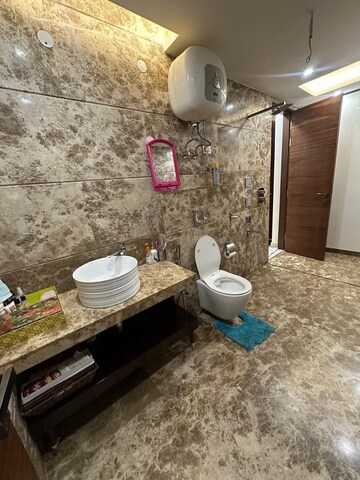 Bathroom in 4 BHK Builder Floor at Green Wood City, Sector 45 – for Sale