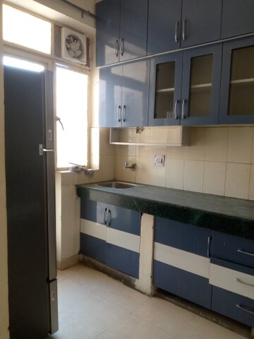 Kitchen in 2 BHK Apartment at Conscient Habitat, Sector 99a – for Rent
