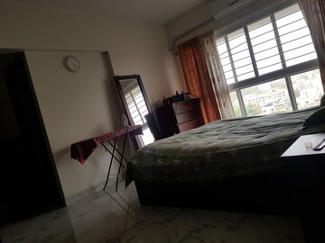 Bedroom in 2 BHK Apartment at Dheeraj Valley, Goregaon East – for Rent