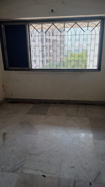 Room in 2 BHK Apartment at Satellite Garden, Goregaon East – for Rent