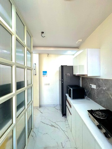 Kitchen in 3 BHK Apartment at Hiranandani Estate, Ghodbunder Road – for Rent