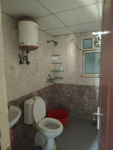 Bathroom in 2 BHK Apartment at Aims Golf City, Sector 75 – for Rent