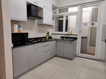 Kitchen in 3 BHK Apartment at Pashmina Waterfront, Old Madras Road – for Rent