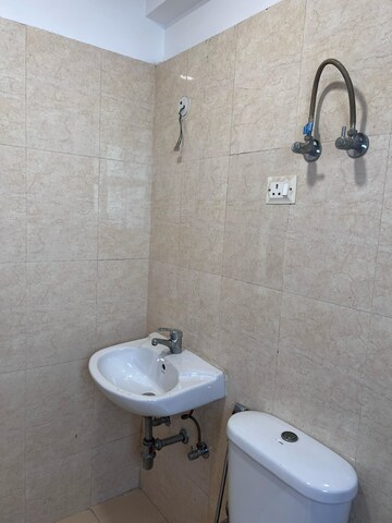 Bathroom in 3.5 BHK Builder Floor at M3M Soulitude, Sector 89 – for Sale