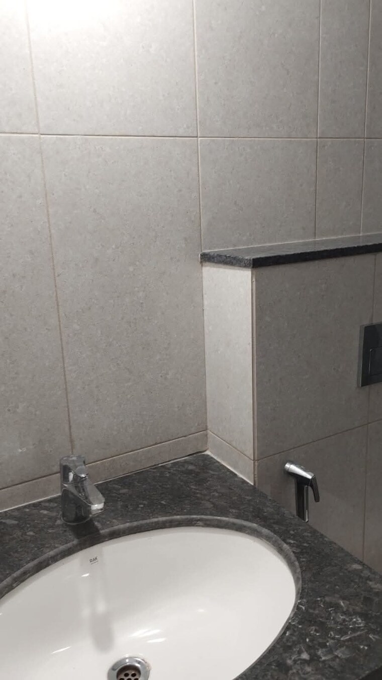 Bathroom, gera-world-of-joy 2.5 Bedroom 1200 Sq.Ft. Apartment In Kharadi Pune 8369833