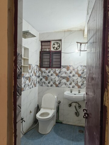 Bathroom in 2 BHK Apartment at Vasundhara Sector 16 – for Sale
