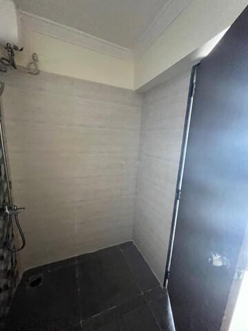 Bathroom in 1 BHK Apartment at Crescent sky Heights, Dahisar East – for Rent
