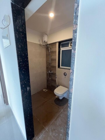 Bathroom in 1 BHK Apartment at Crescent sky Heights, Dahisar East – for Rent