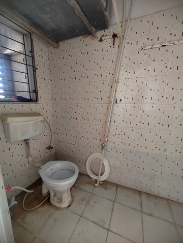 Bathroom in 1 BHK Apartment at Royal Palms, Goregaon East – for Rent