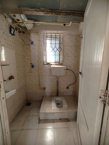 Bathroom in 1 BHK Apartment at Royal Palms, Goregaon East – for Rent