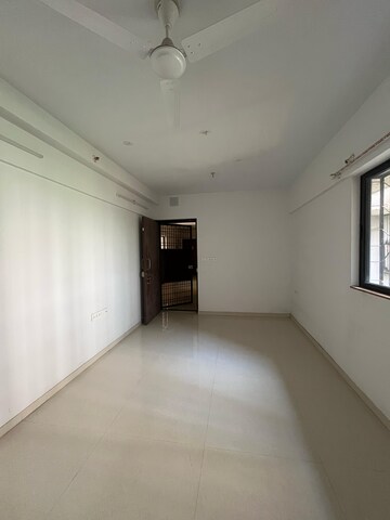Living Room in 1 BHK Apartment at Lodha Palava Downtown Dombivli East, Dombivli East – for Rent