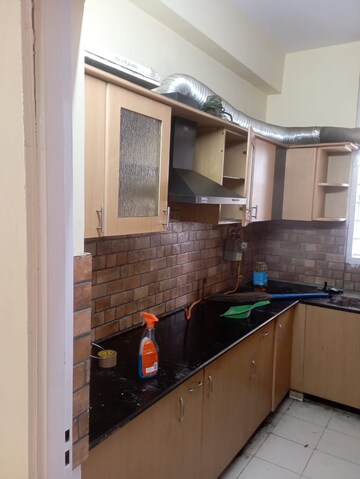Kitchen in 2 BHK Apartment at Jaipuria Sunrise Greens, Ahinsa Khand 1 – for Rent