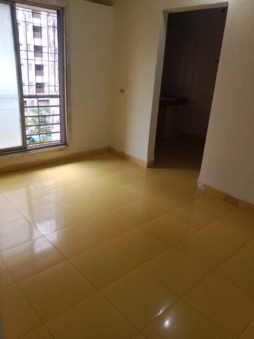Living Room in 1 BHK Apartment at Rashmi Star City, Naigaon East – for Rent
