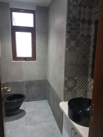 Bathroom in 4 BHK Apartment at Vasant Kunj – for Rent