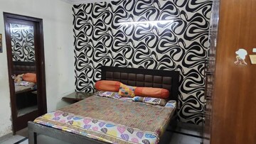 Bedroom in 2 BHK Builder Floor at Kalkaji – for Rent