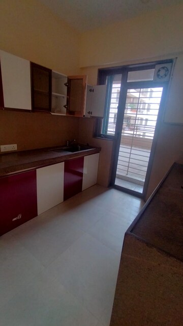 Kitchen in 2 BHK Apartment at Sahyadri Shruberry, Moshi – for Rent