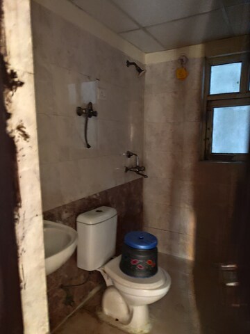 Bathroom in 2.5 BHK Apartment at Aims Golf City, Sector 75 – for Rent