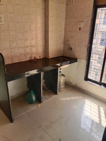 Kitchen in 1 BHK Apartment at Maad Yashwant Pride-Kini Complex, Naigaon East – for Rent