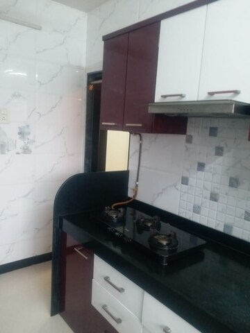 Kitchen in 2 BHK Apartment at Kshitij CHS, Goregaon East – for Rent