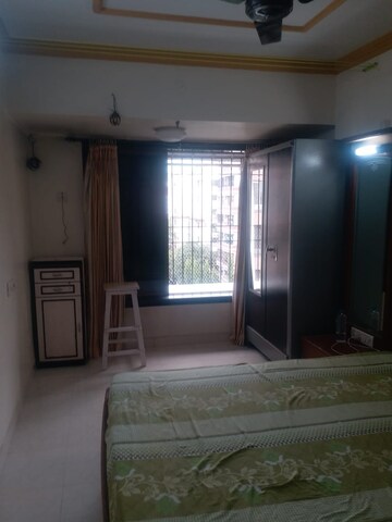 Bedroom in 2 BHK Apartment at Kshitij CHS, Goregaon East – for Rent