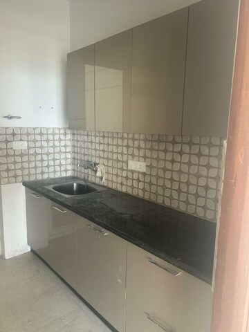 Kitchen in 3 BHK Apartment at ATS Pristine, Sector 150 – for Rent