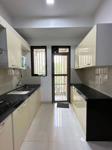 Kitchen in 2 BHK Apartment at Lodha Luxuria, Majiwada – for Sale