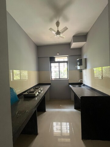 Kitchen in 1 BHK Apartment at Lodha Downtown, Dombivli East – for Sale
