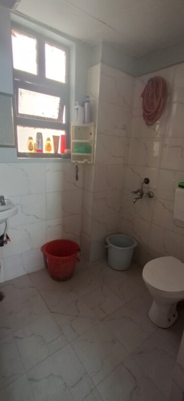 Bathroom in 1.5 BHK Apartment at Auric City Homes, Sector 82 – for Rent